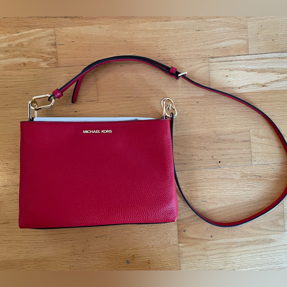 Michael Kors. Red Cross body purse. 10” length x 7” height.